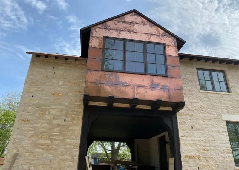Copper metal panel facade on a stone building for Metal Roof Coating in East Renton Highlands