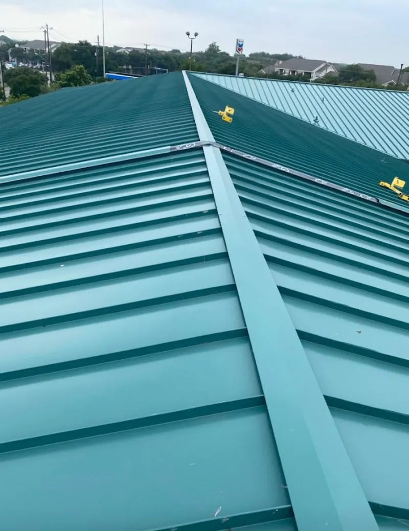 Green commercial metal roof ridge and valley for Metal Roof Repair in East Renton Highlands